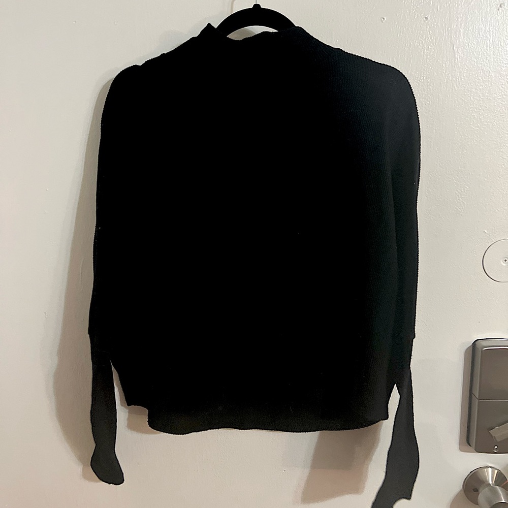 Black, long sleeve, flowy shirt. Lightweight.